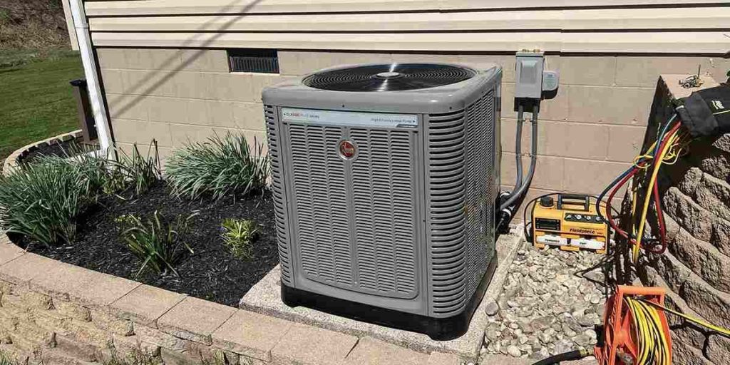 Outdoor Rheem AC unit setup